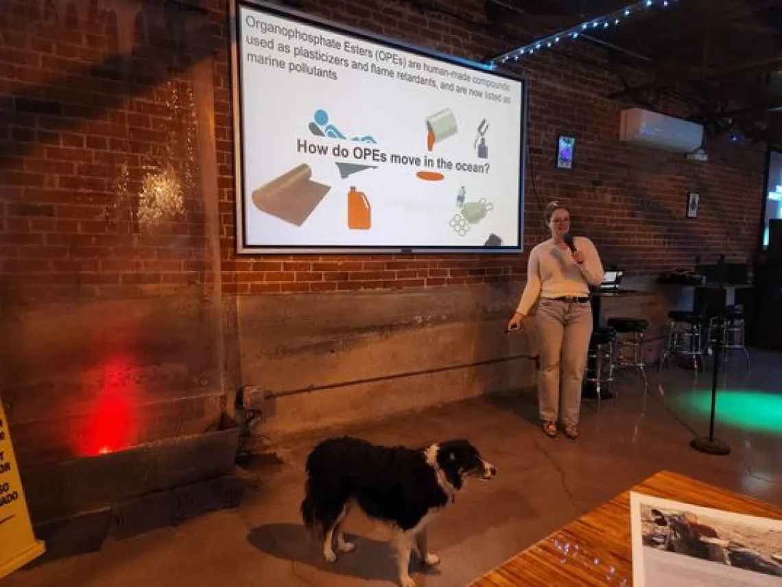 Carson Scholar Emily Waggoner presenting her environment talk at Sky Bar