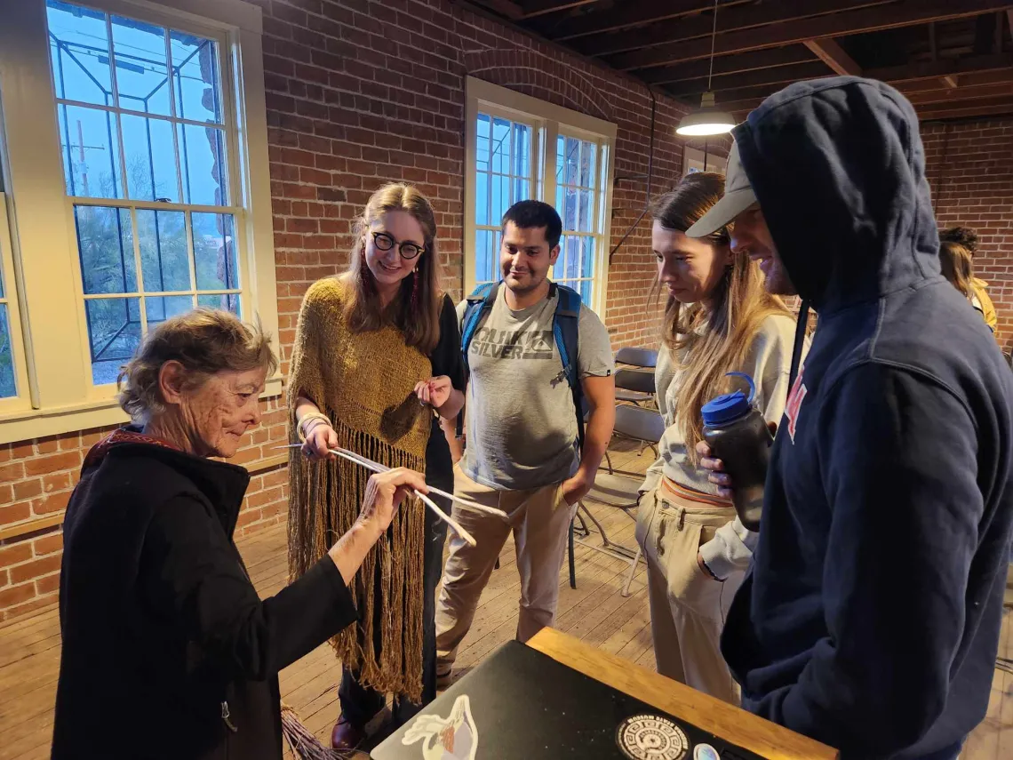 Carson Scholar Jennifer Byram (second from left) talking to audience after her public talk