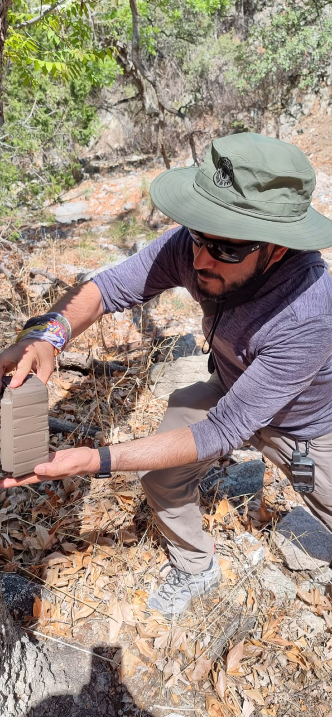 Miguel Grageda setting up wildlife camera